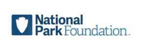 Logo of the National Park Foundation, featuring text with a blue shield icon.
